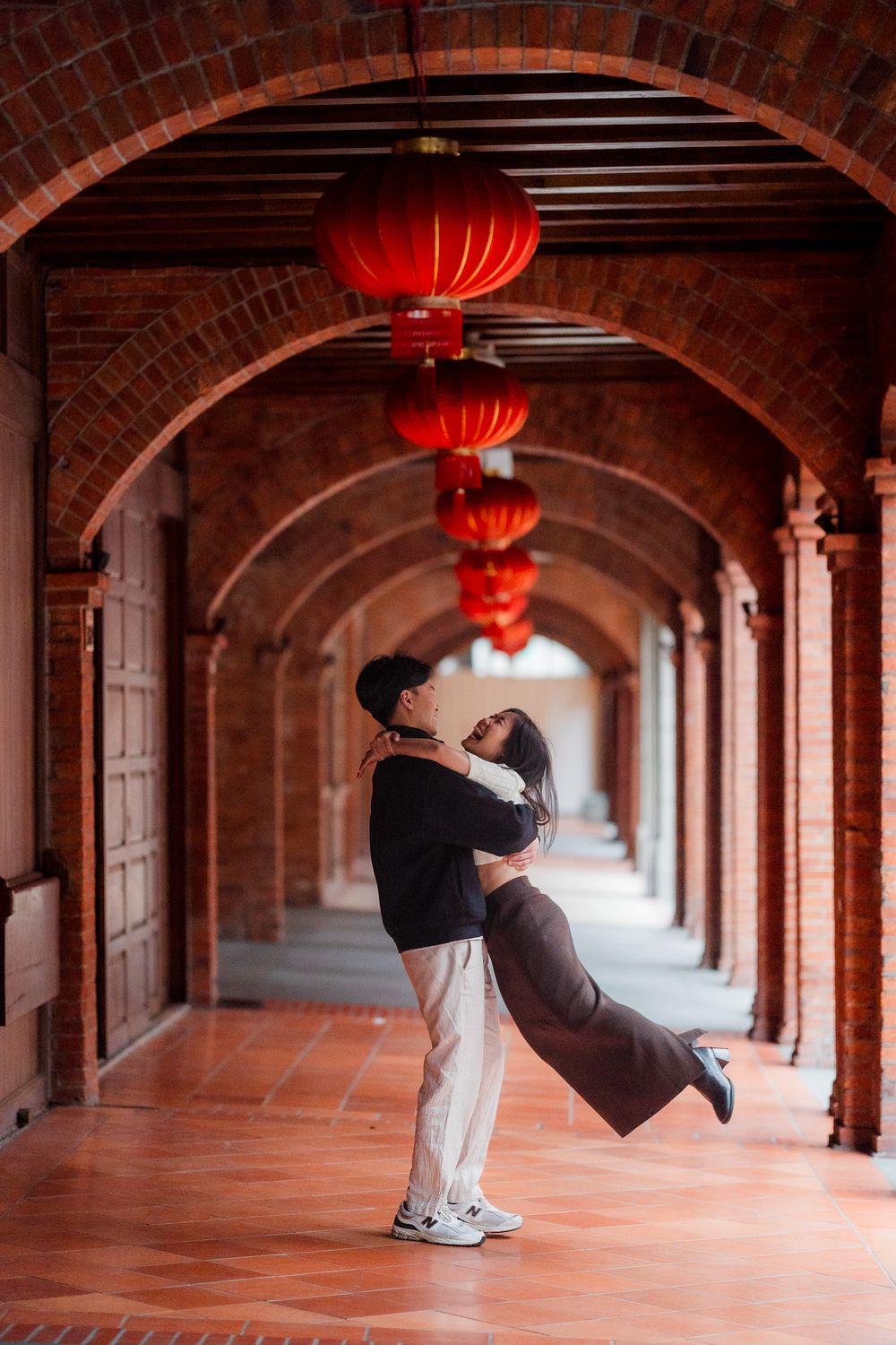 A sequence of photos showing a red lantern floating through an arched brick corridor with terracotta flooring.