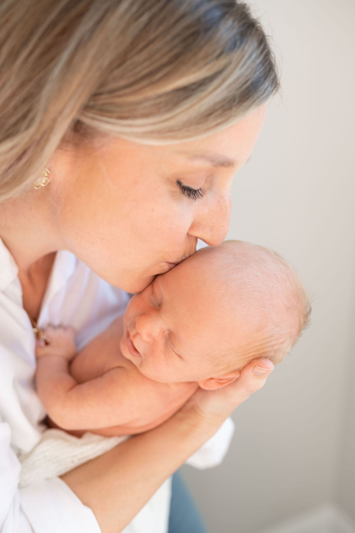 Close up mother with newborn baby soft natural light Nashville newborn photography