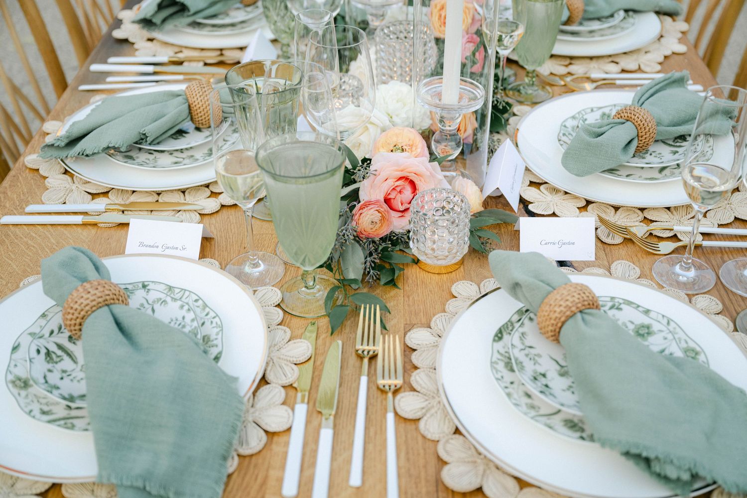 Elegant wedding reception table settings with sage green napkins, white plates, and peach floral centerpieces. - Elawa Farm