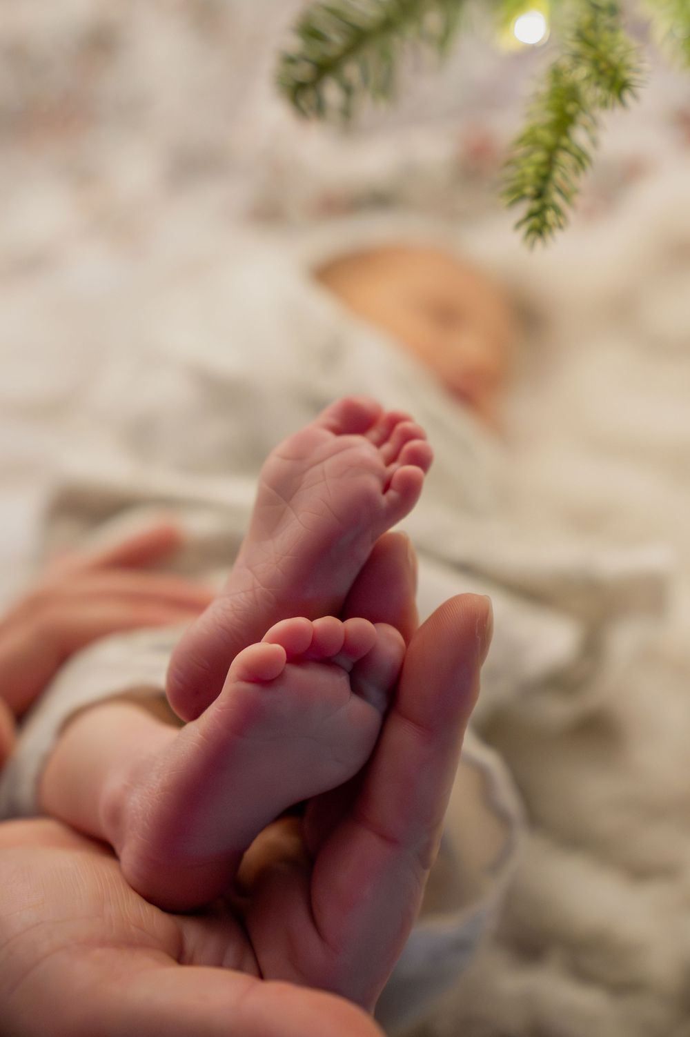 Close-up photos of delicate baby feet and toes against a soft white background.