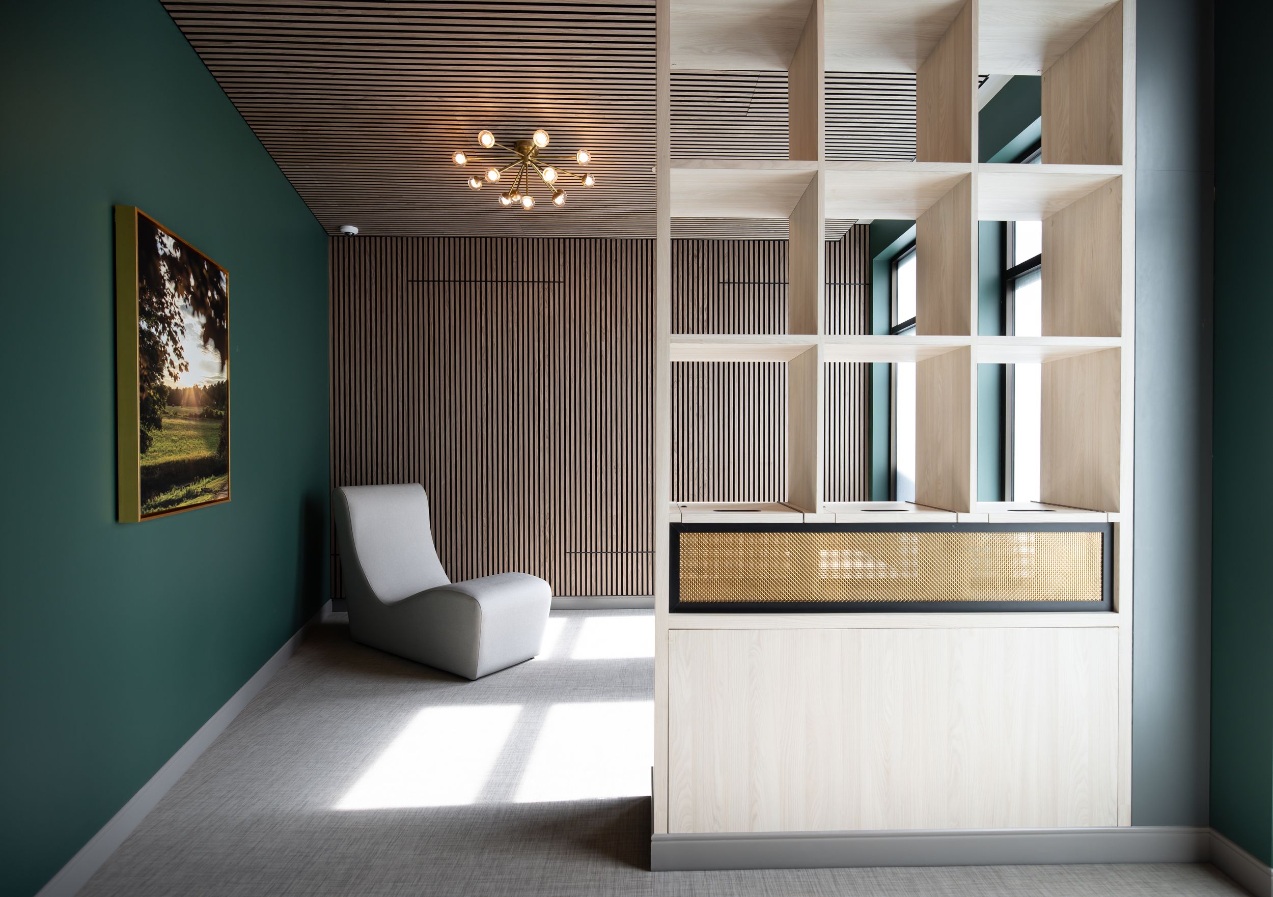 Modern interior design features a minimalist room with dark wood paneling, white accents, and contemporary lighting fixtures.
