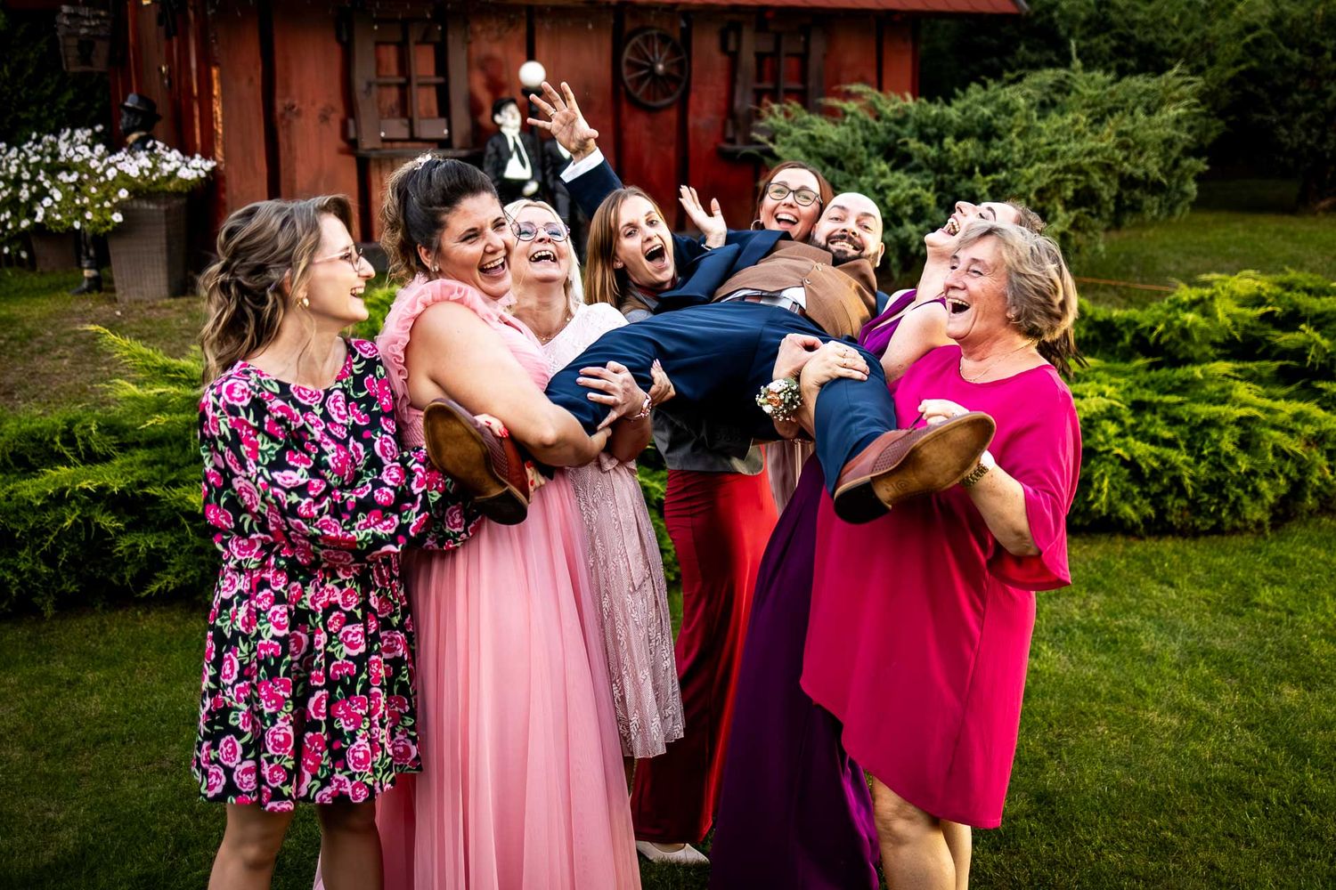 Celebration with colorful smoke effects creates vibrant moments during outdoor wedding photography.