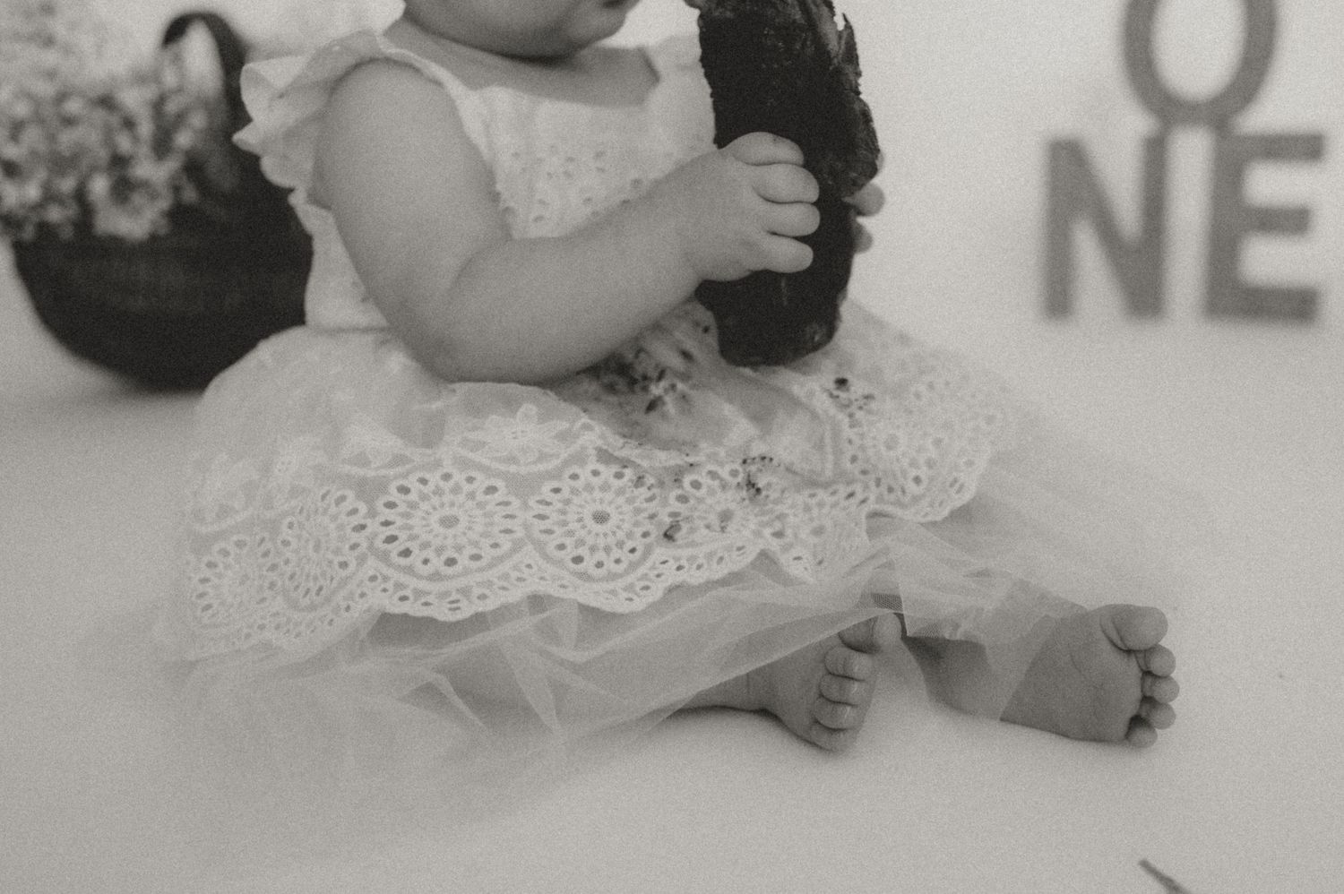 Indiana Motherhood and Newborn Photographer // Black and white series of baby wearing lace dress during professional milestone session.
