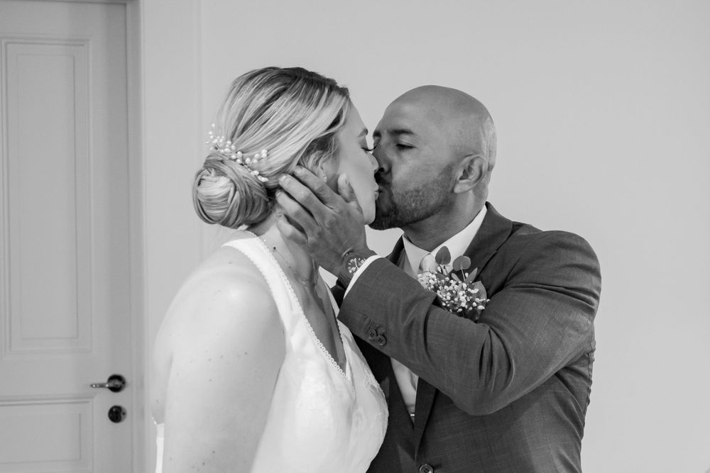 Groom and bride give their first kiss after their wedding in Geneva, Switzerland