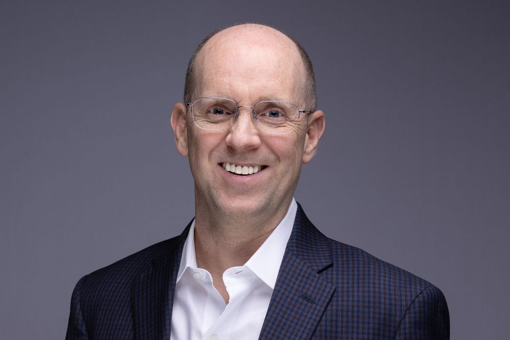 Corporate Headshot of a smiling executive | Montclair headshot photographer