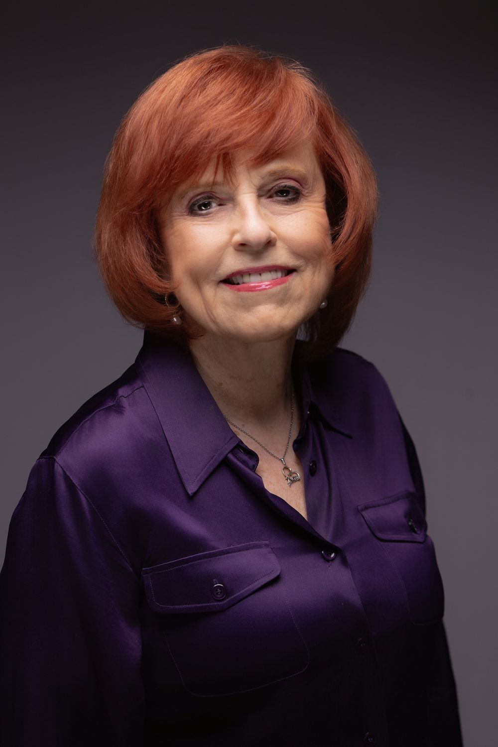 Professional headshot of a woman with a pleasant smile | NJ corporate headshots