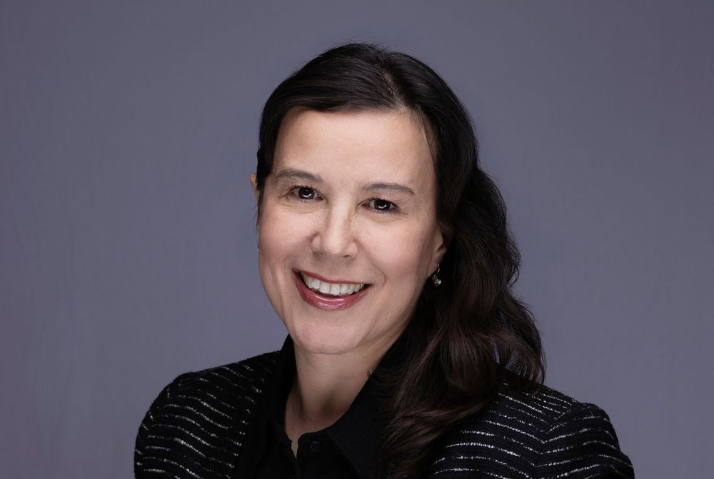Professional photo of a smiling woman | NJ corporate headshots