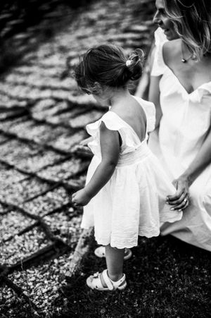 Child smiling naturally during a family photo session