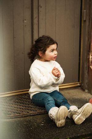 Natural light portrait of a mother with her little girl