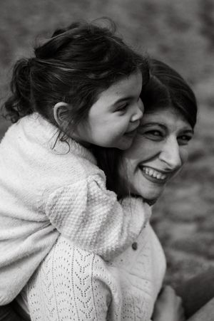 Natural light portrait of a mother with her little girl