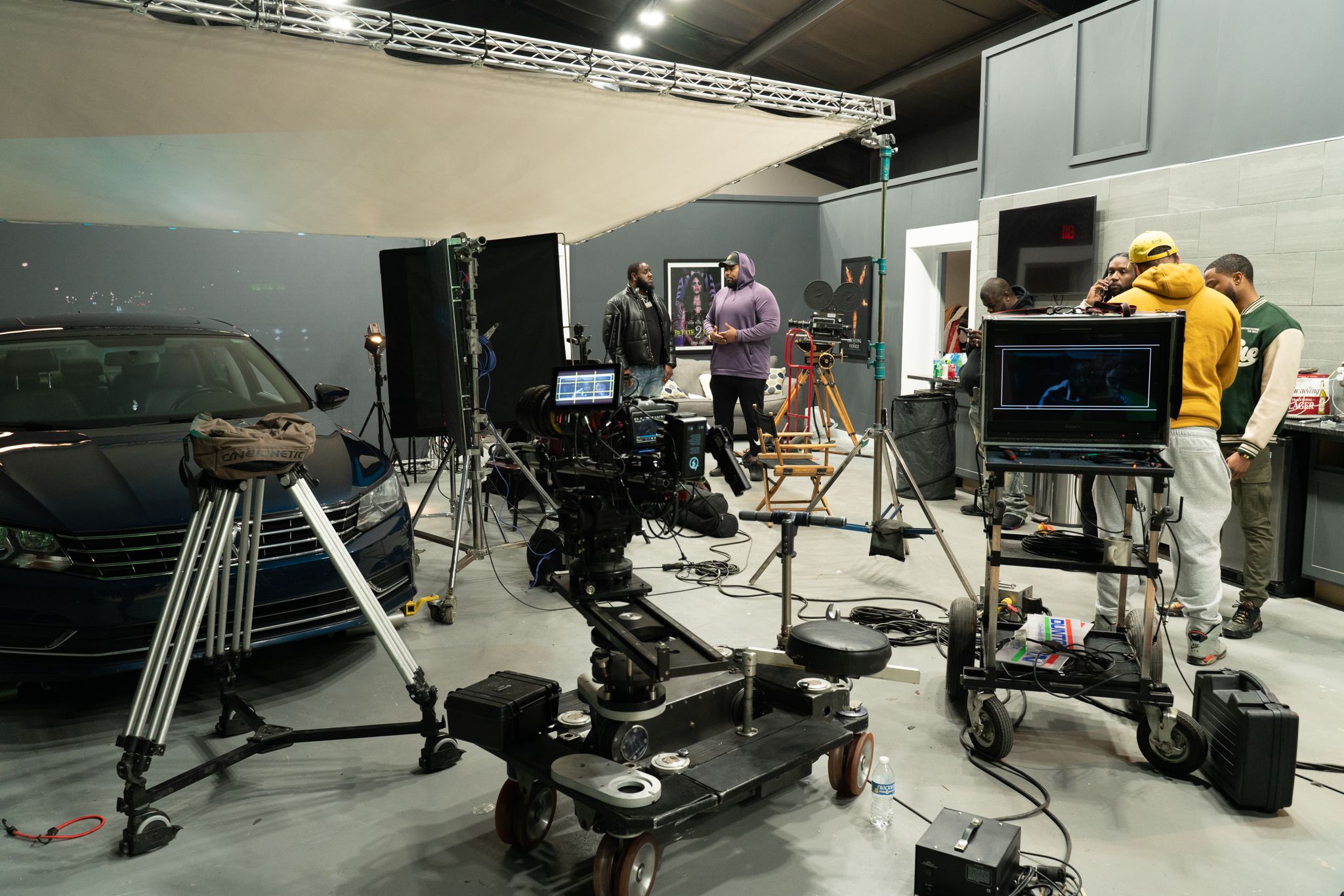 Wide angle view of a modern salon interior with multiple styling stations and equipment.