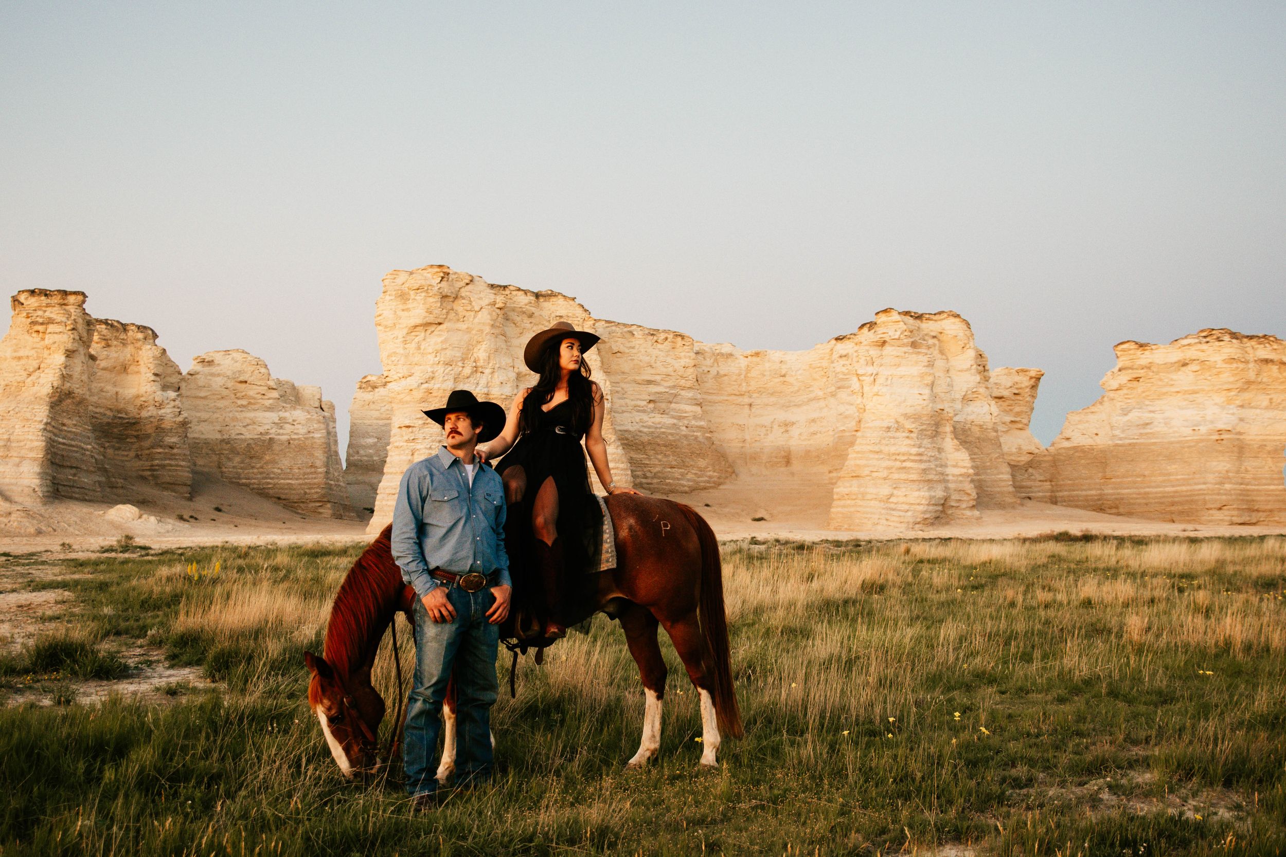 A series of five connected photos showing horses and people in a scenic desert landscape with rock formations at sunset.