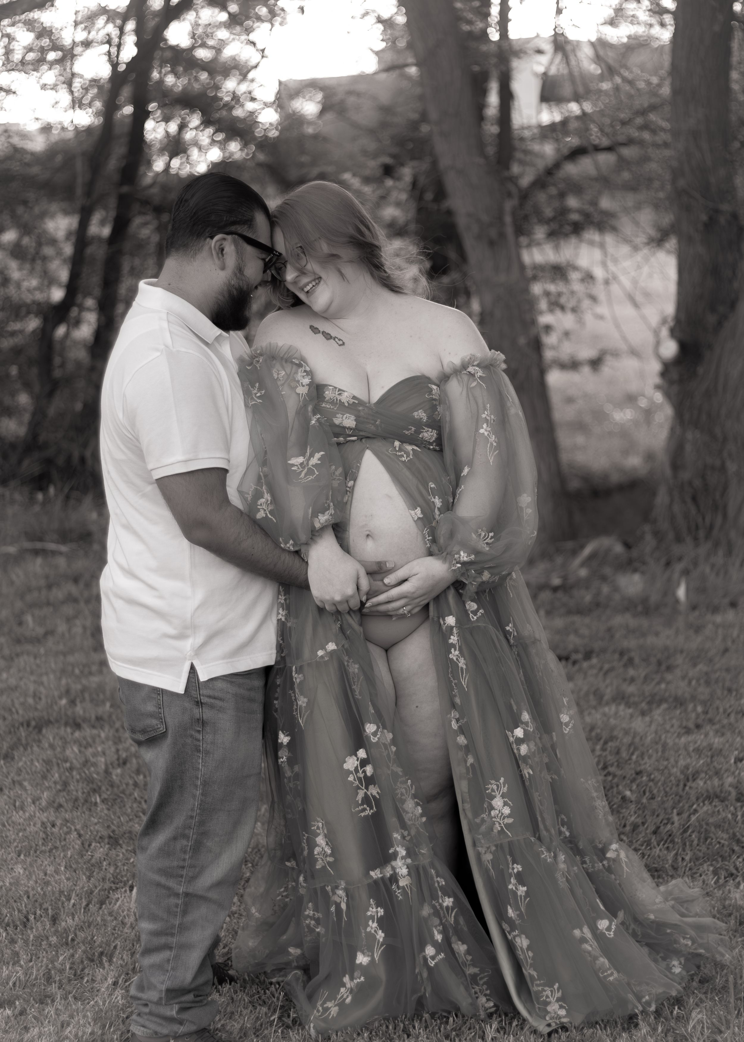 A black and white photo sequence showing a couple in casual attire standing together outdoors among trees.