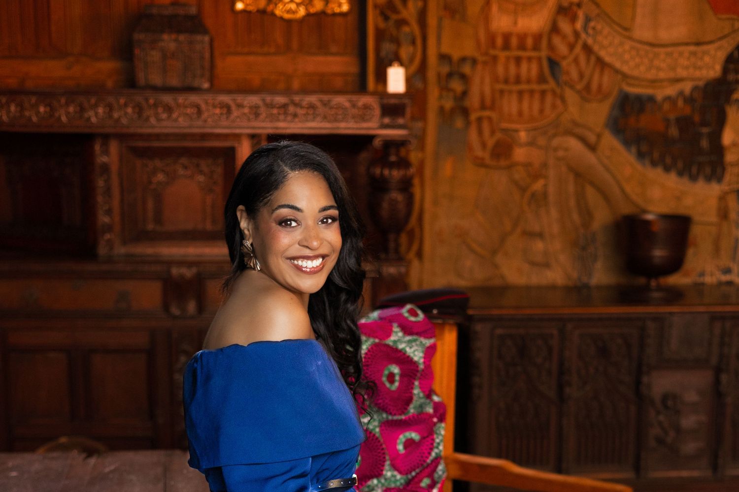 Ellisha Soanes personal branding photoshoot at Tudor room in the Christchurch mansion in Ipswich, biracial, smiling, empowering, legacy