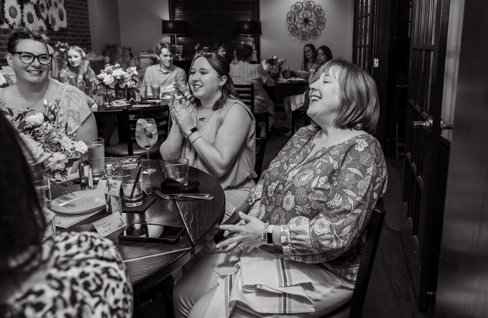 Black and white photos of guests celebrating at a bridal shower event.