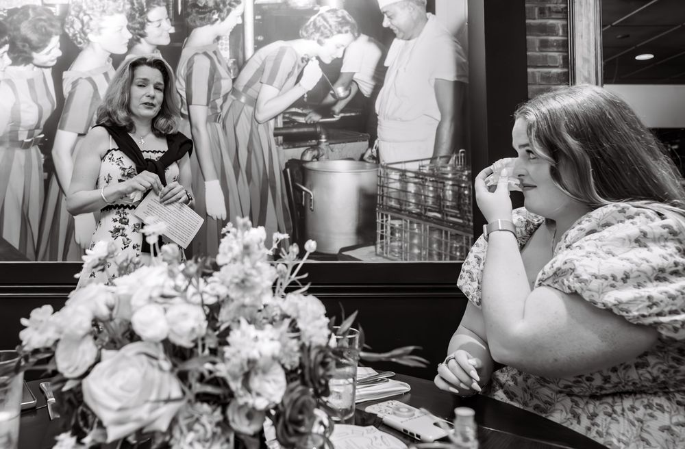 Black and white images of a bridal shower celebration with floral decorations.