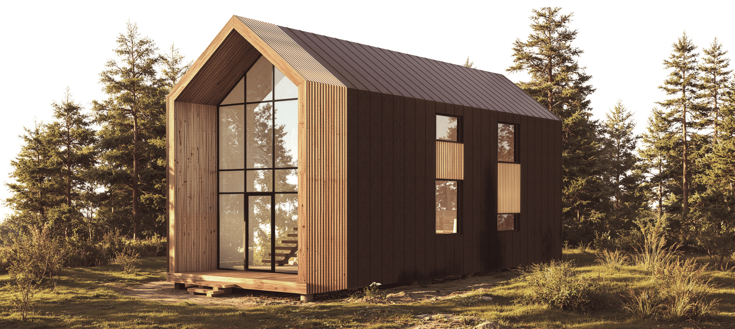 Sleek container-style home with black metal cladding and horizontal window design in desert setting.