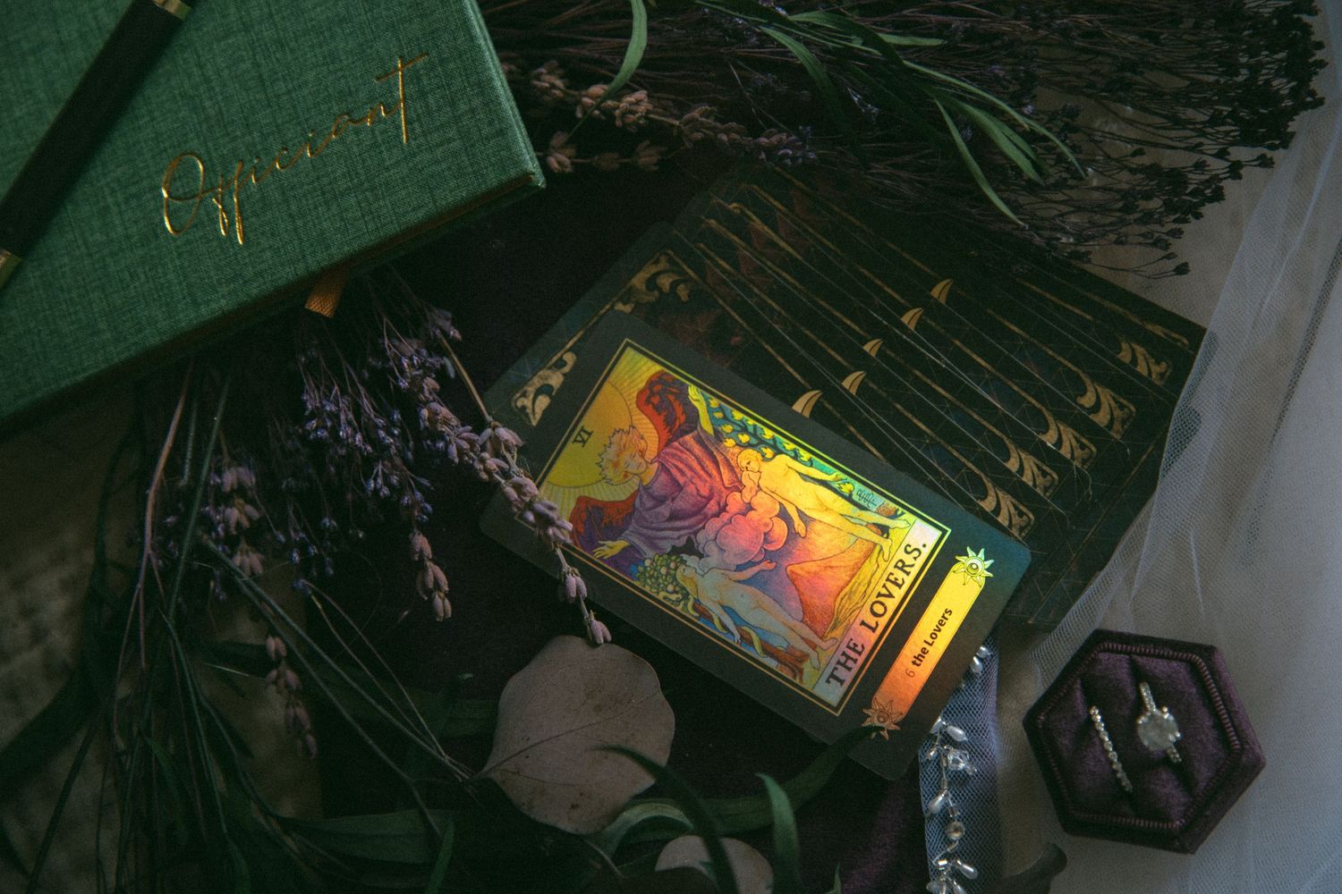 the lovers tarot card elopement details officiant book dried florals engagement ring moody witchy asheville