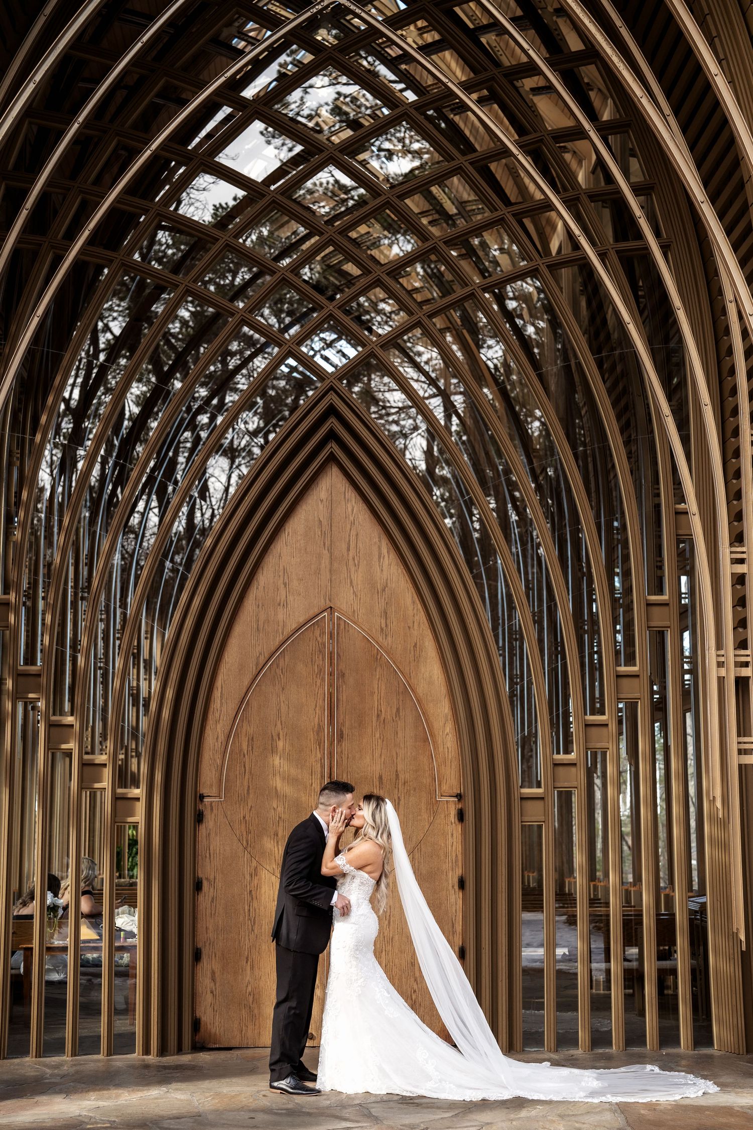 Intimate elopement at Mildred B. Cooper Memorial Chapel in Bella Vista, Arkansas with romantic, cozy emotions