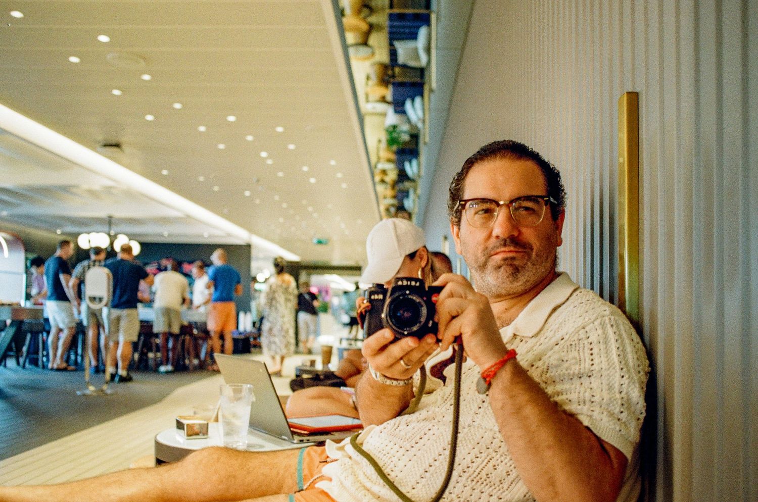 Casual dining scene at a cafe captured on vintage film.