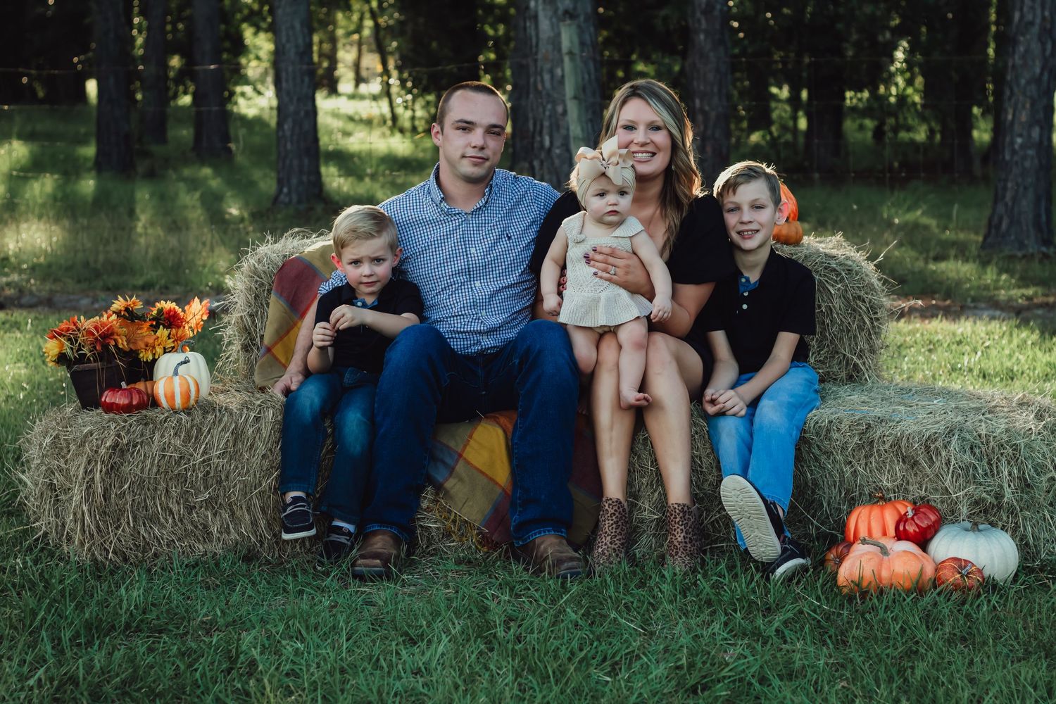 Fall mini with pumpkins and a hay couch.