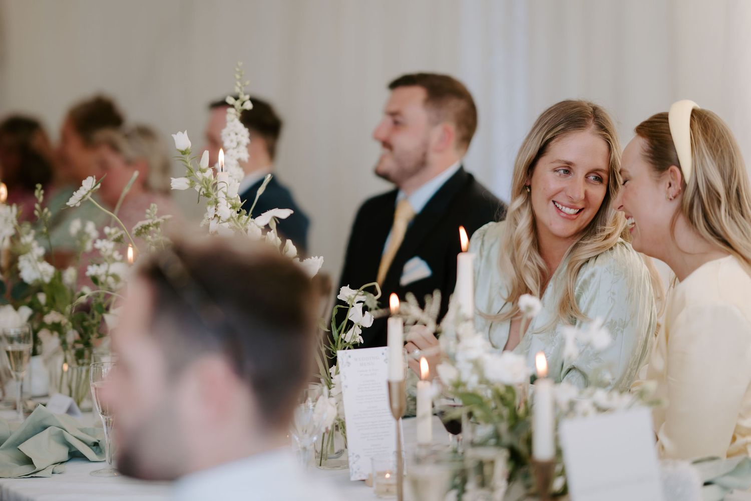 wedding guests enjoying father of brides speech at hamswell house wedding in bath