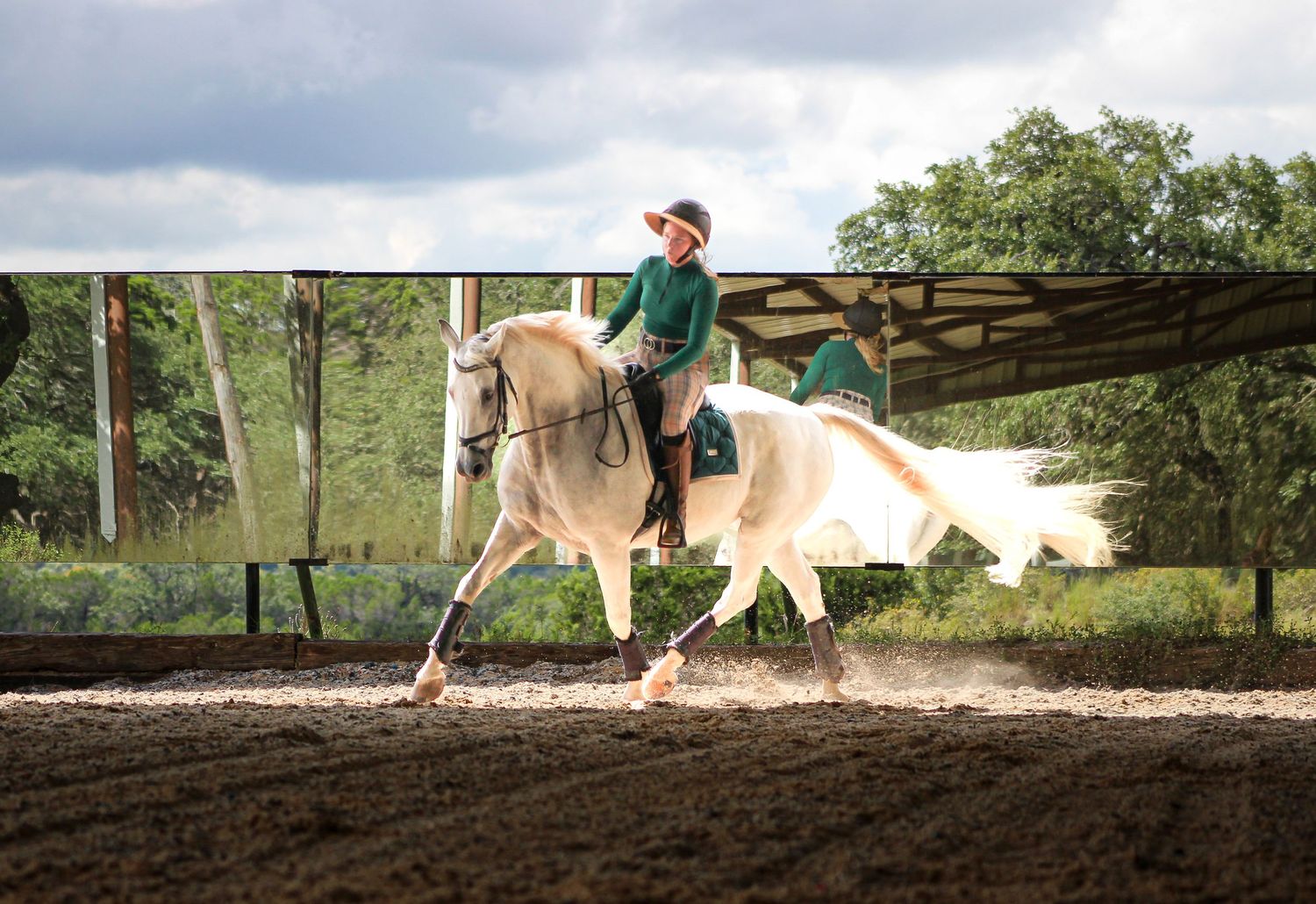 Captured in Driftwood, TX, this equestrian photography session embodies the beauty of horse and rider harmony, dressage and peace.