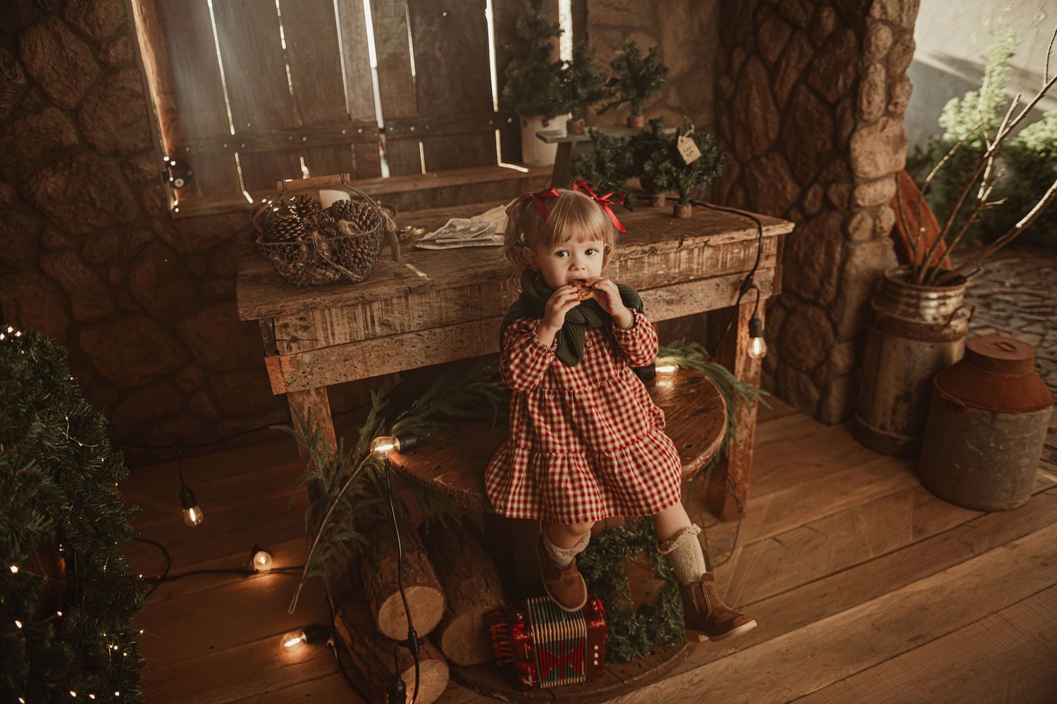 A nostalgic holiday setting with a child in checkered dress surrounded by lanterns and vintage Christmas decorations.