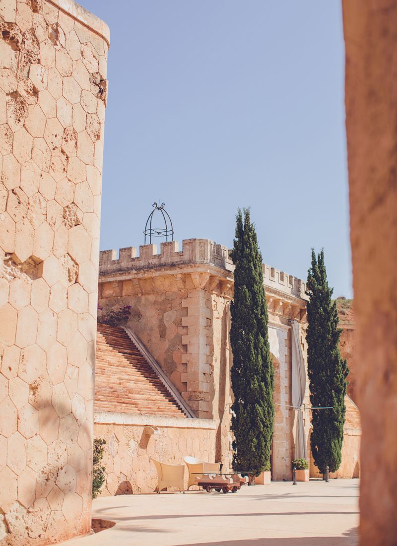 Historic Mallorca wedding venue Cap Rocat courtyard with cypress trees