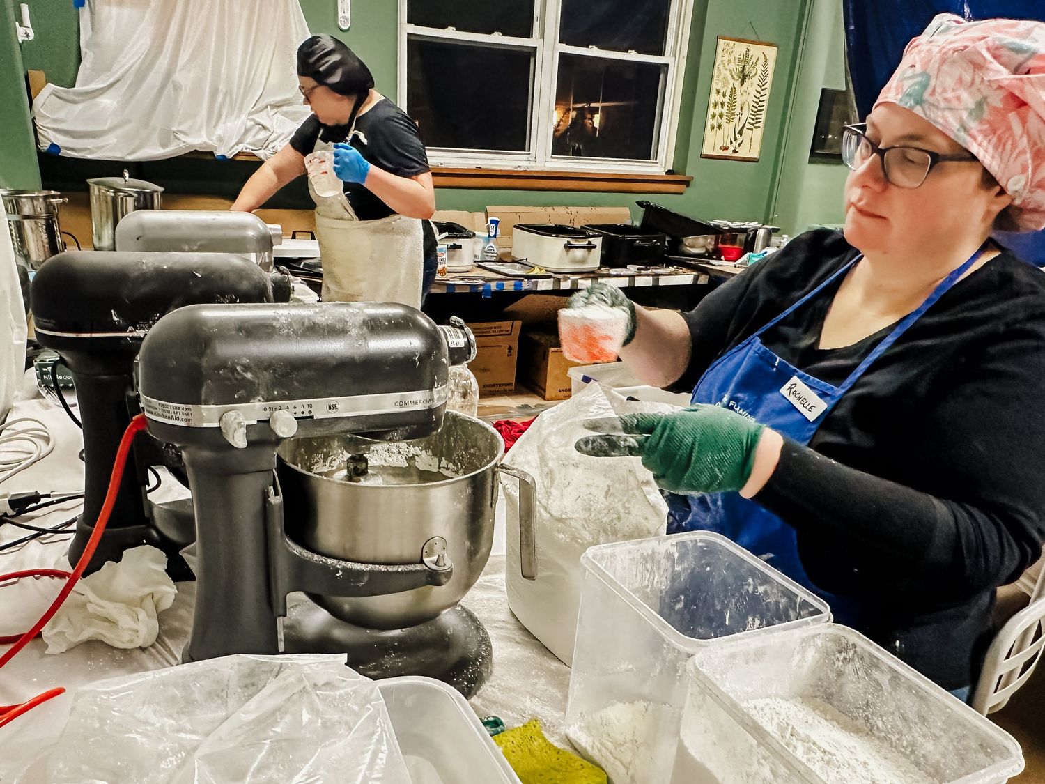 Paloma School’s kitchen filled with activity, capturing the essence of teamwork and tradition.