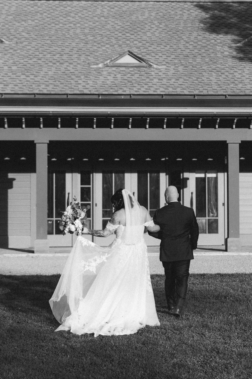 A black and white photo sequence shows a bride's dress flowing in the wind outside a building.