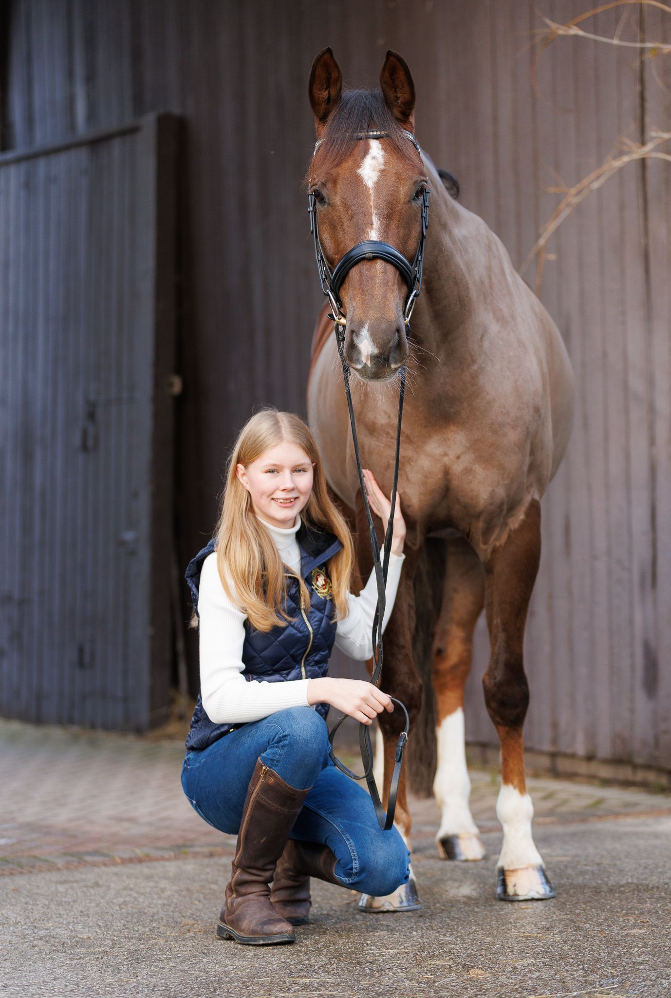 A series of photos showing a person in a white polka dot shirt with a black horse in a golden autumn field.