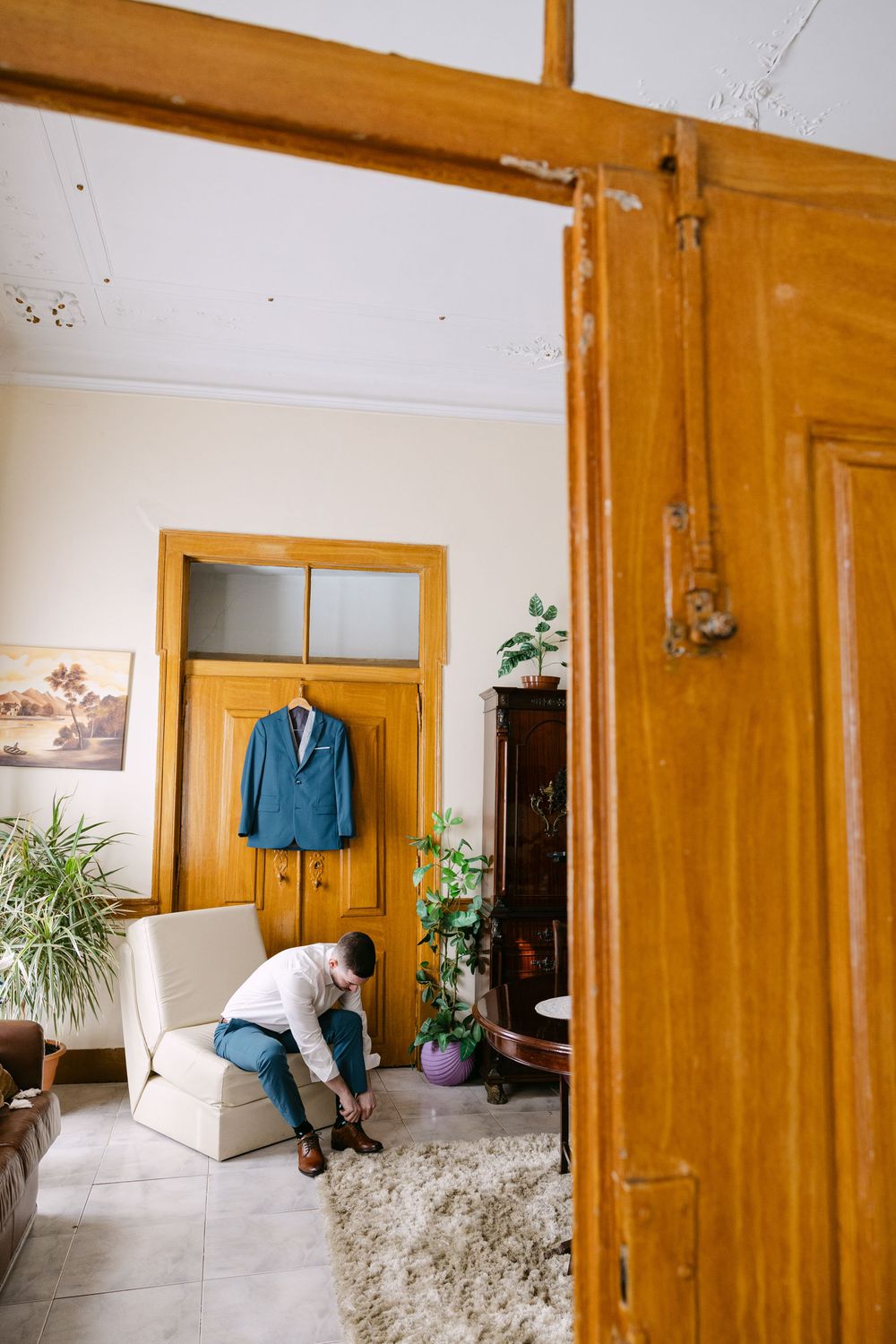 groom suit hanged in his grandparents house in Almada during a wedding
