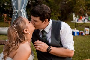 A series of romantic wedding photos showing couples sharing intimate kisses in an outdoor garden setting.