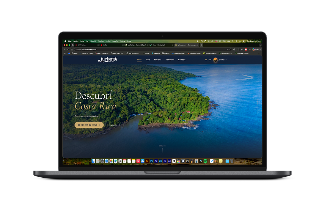 MacBook Pro displaying a Costa Rica travel website with lush green rainforest aerial view and 'Descubri Costa Rica' text.