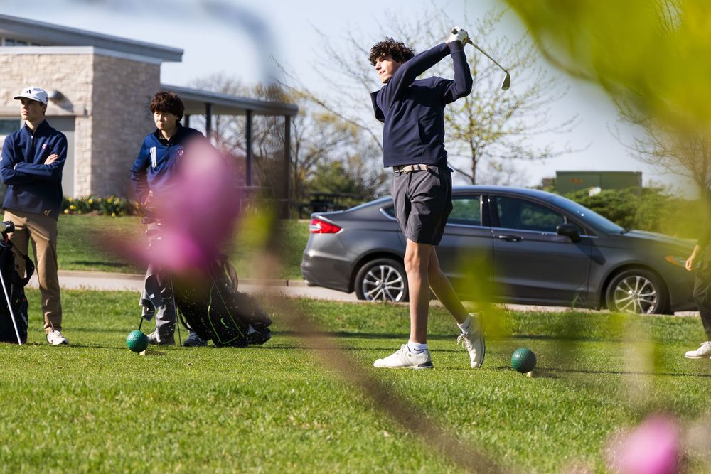 Benjamin Winograd watching his ball travel down-range. Luke Ye photography, Luke Ye,