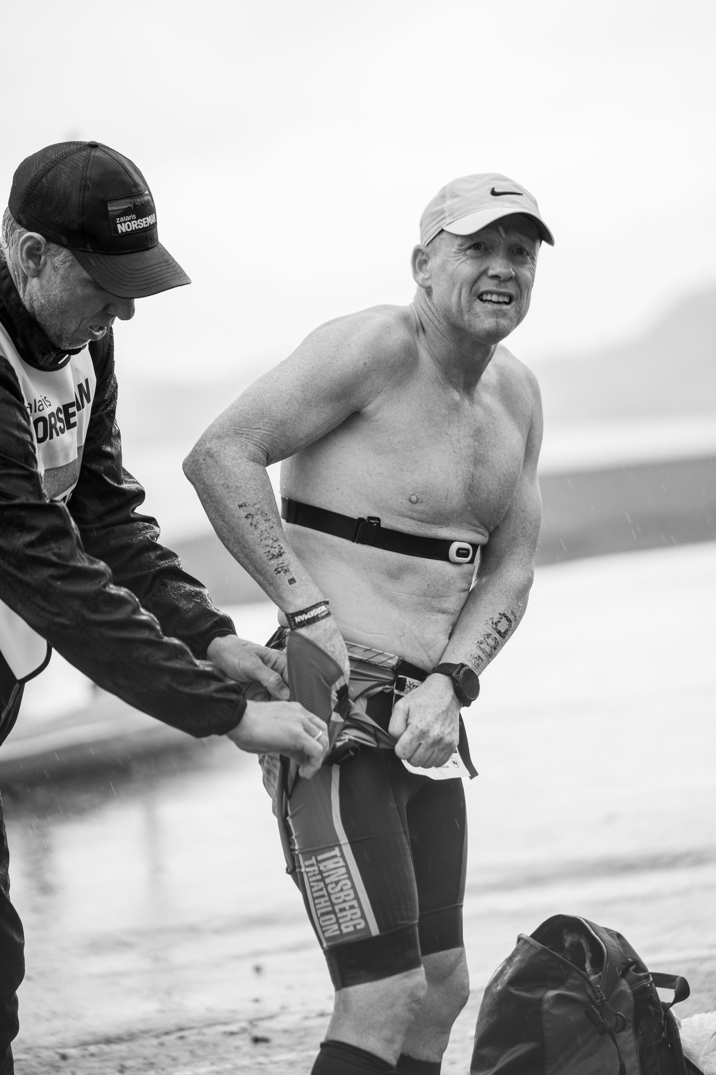 Series of images showing someone adjusting their athletic gear and compression sleeve during an outdoor run.