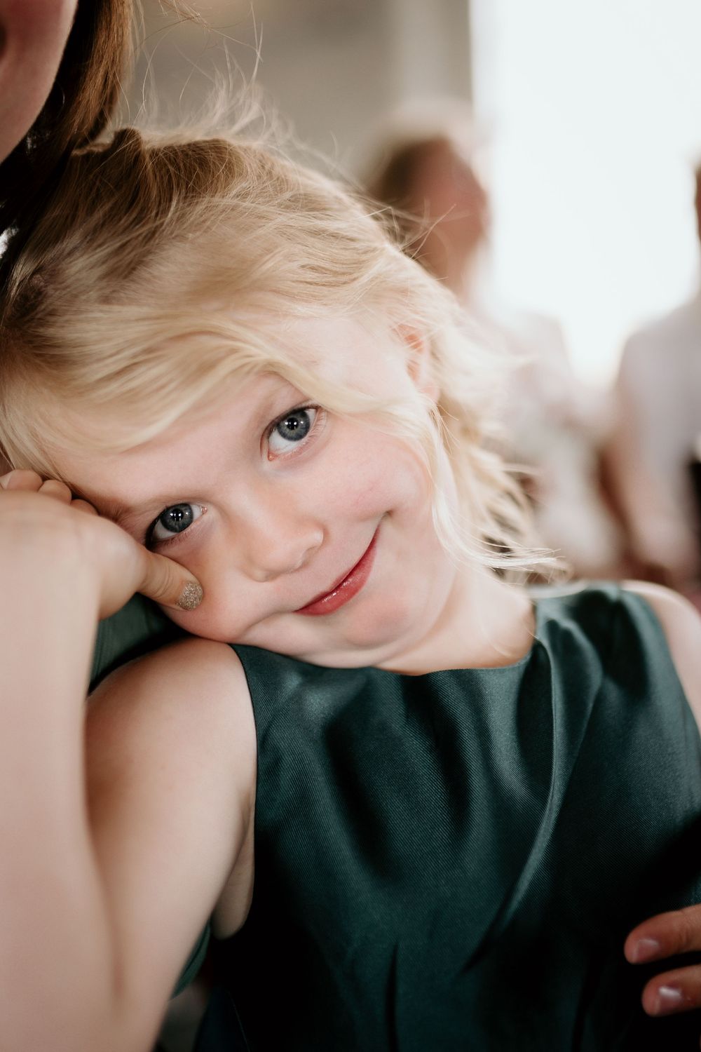 Soft focus portrait showing bright eyes and gentle expression in natural light.