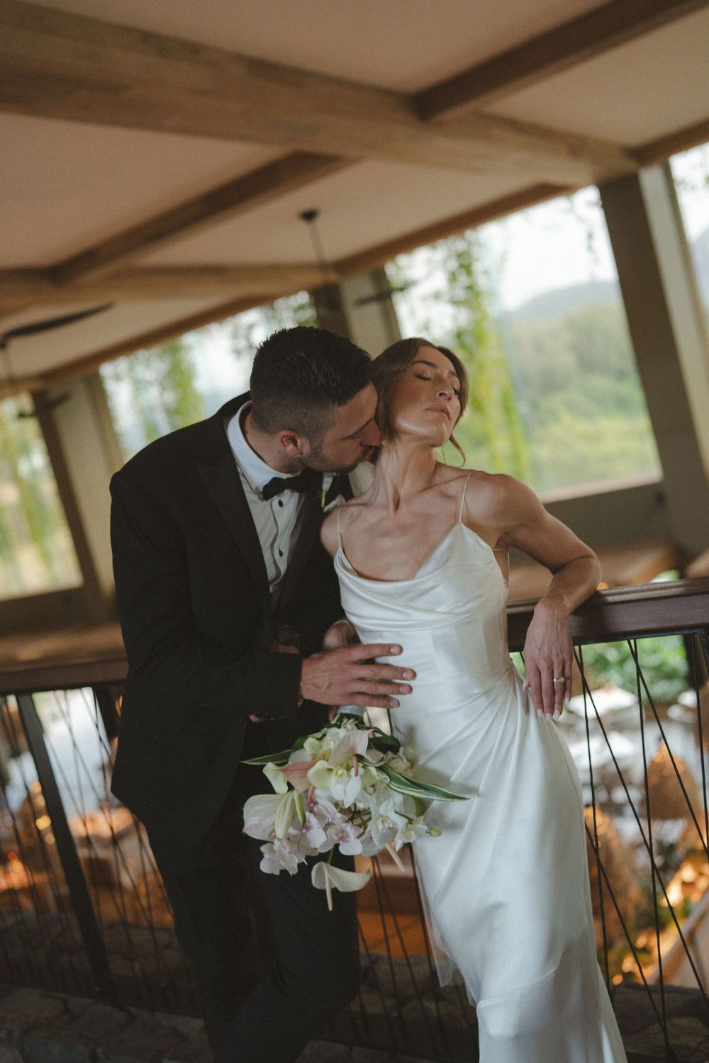 Bride and groom kissing at 1 Hotel Hanalei Bay