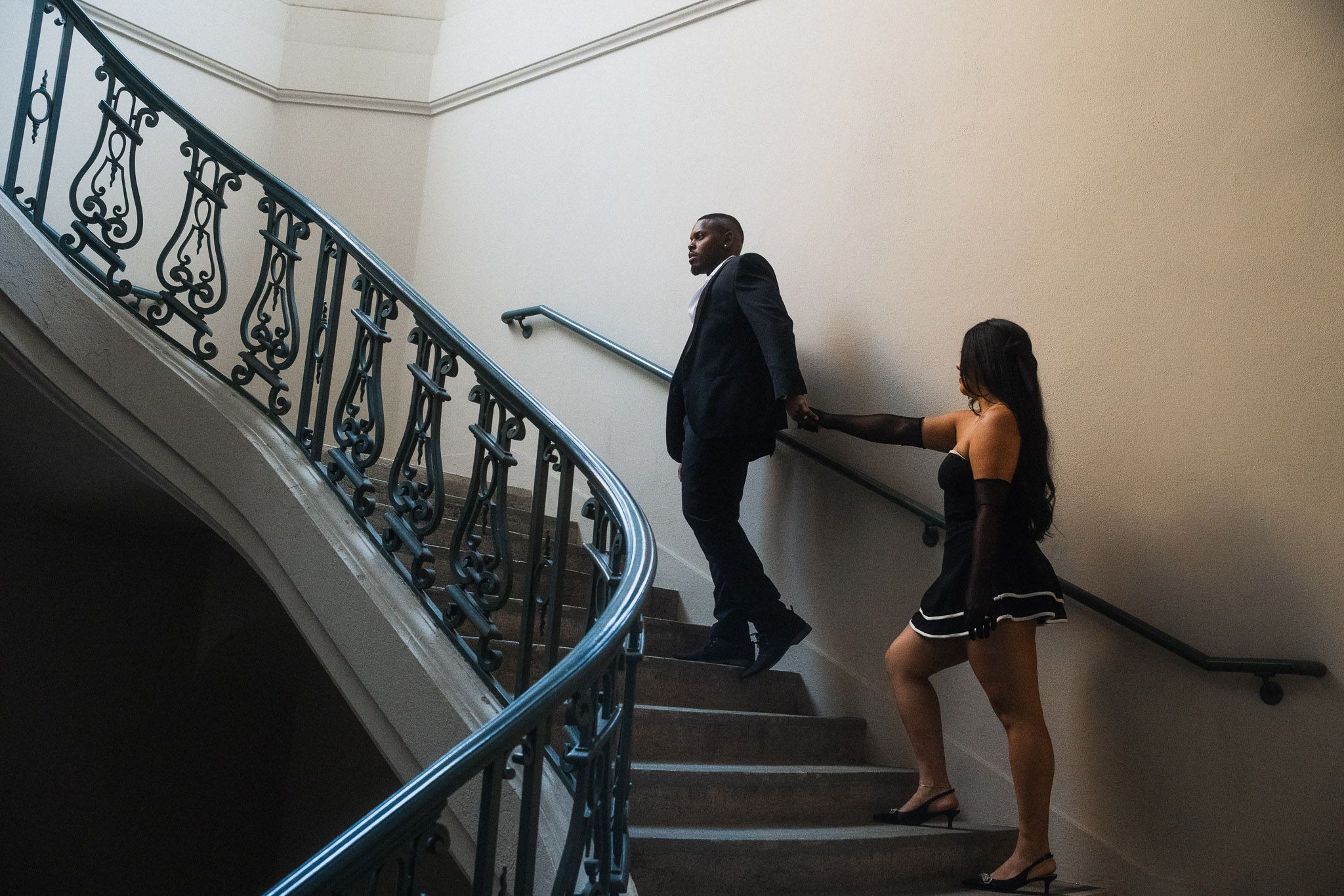 Yvonne & Sam Walking up the stairs at Pasadena City Hall for their Photoshoot