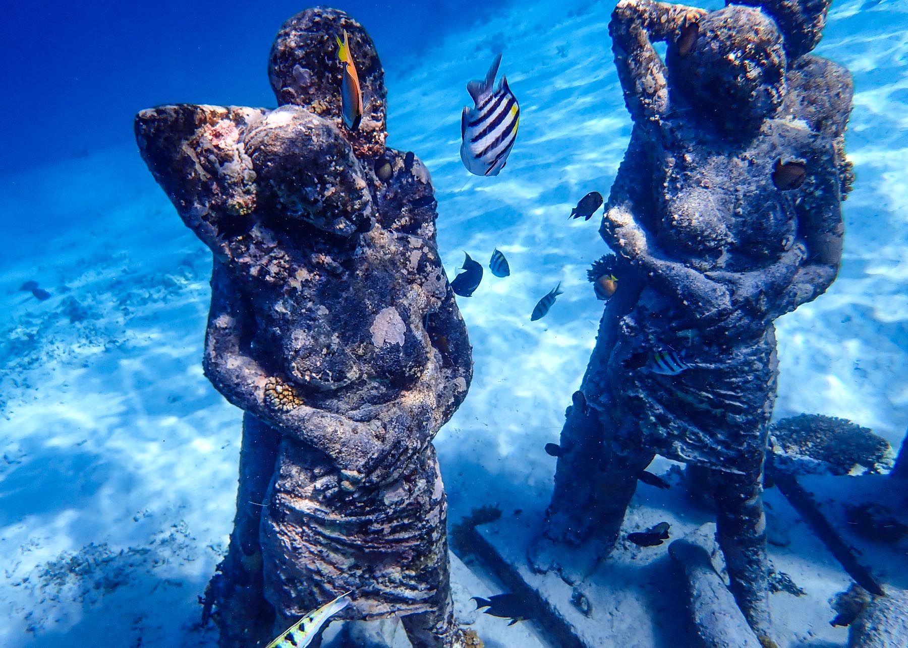 Underwater statue scene off Gili Meno