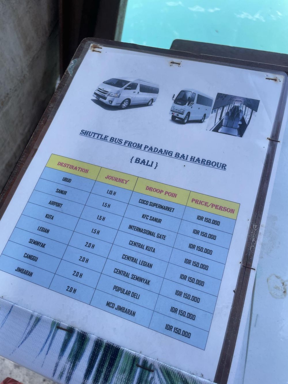 Shuttle bus schedule from Padang Bai Harbour Bali showing destinations, journey times, and prices per person.