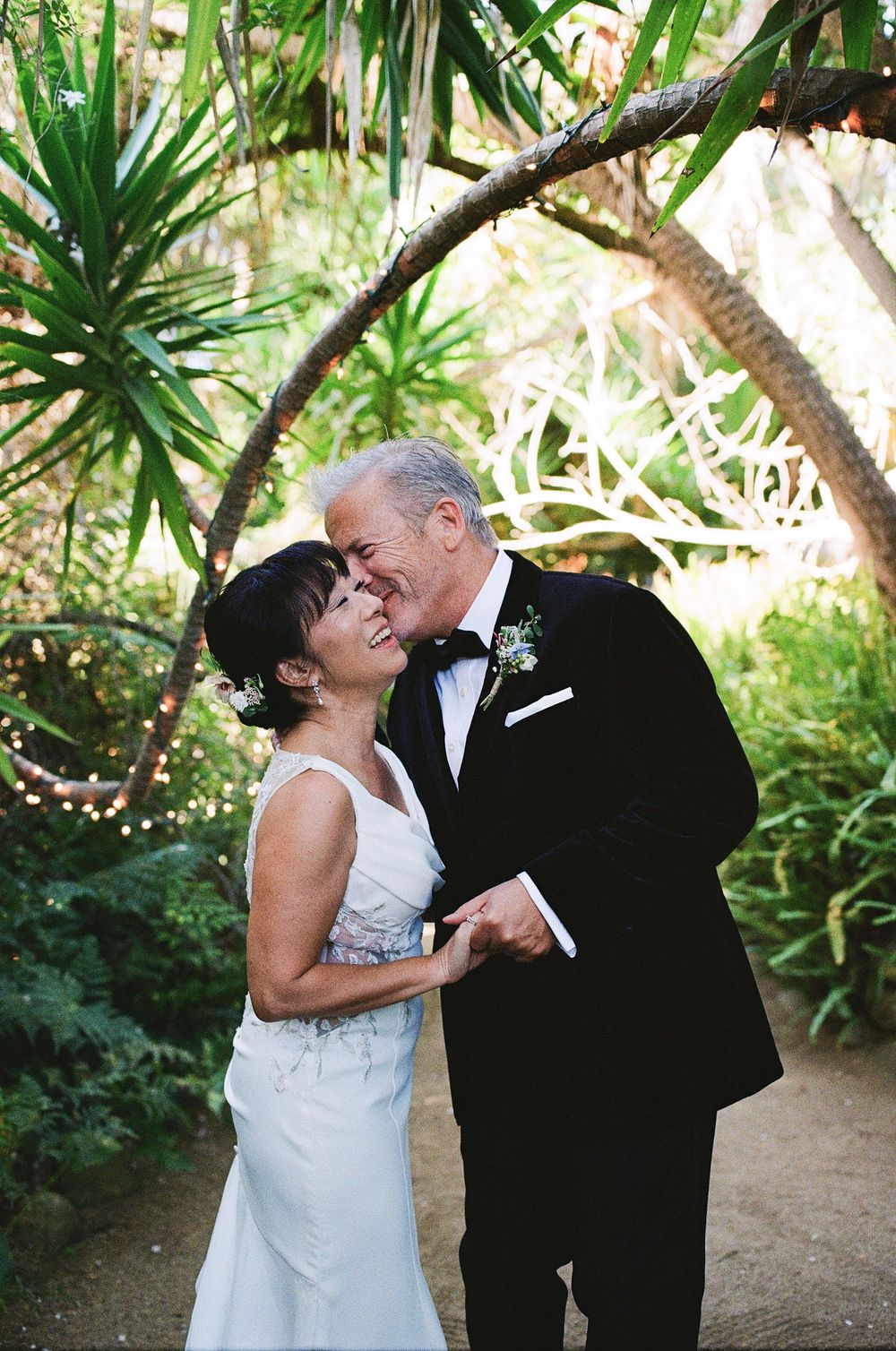 Film photo of wedding in context of photographer sharing relocation plans to NC