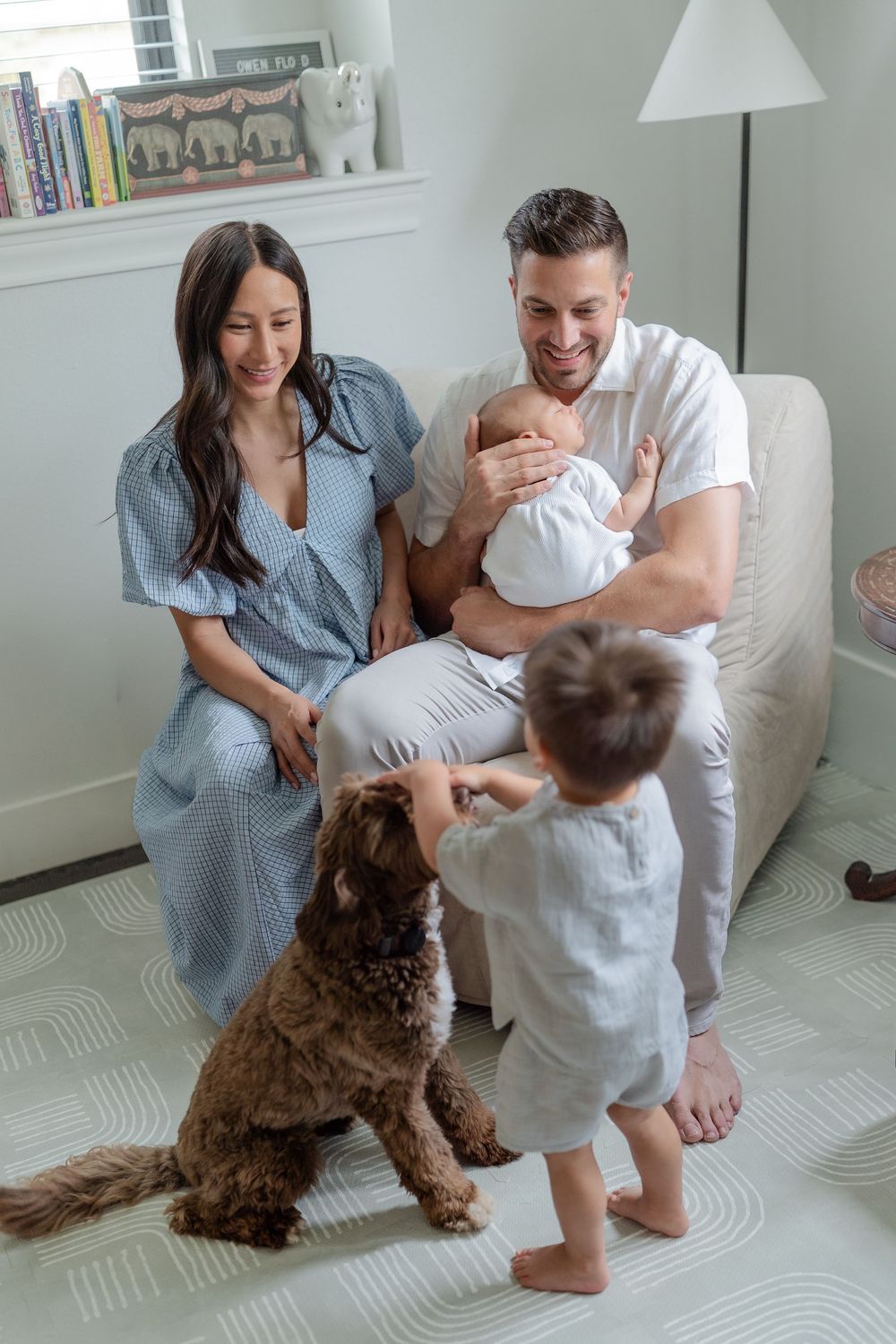 Newborn Lifestyle Family Session by Houston Photographer in home with dog