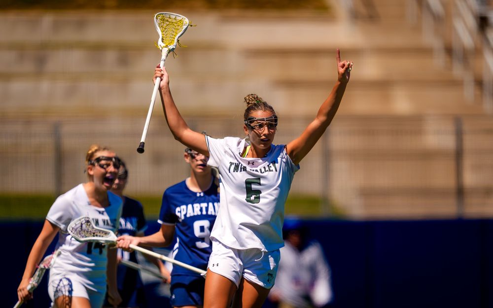 Twin Valley player raises stick after goal vs Wyomissing, PIAA 2A girls lacrosse, by Deanna Fox, SportsFox Photography based in Hershey PA