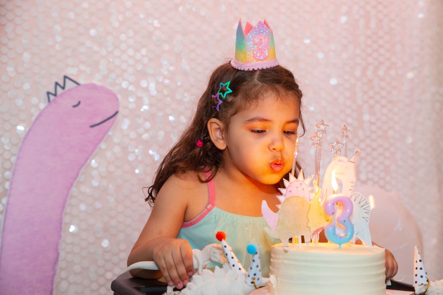 Kids party photography Los Angeles blowing out candles