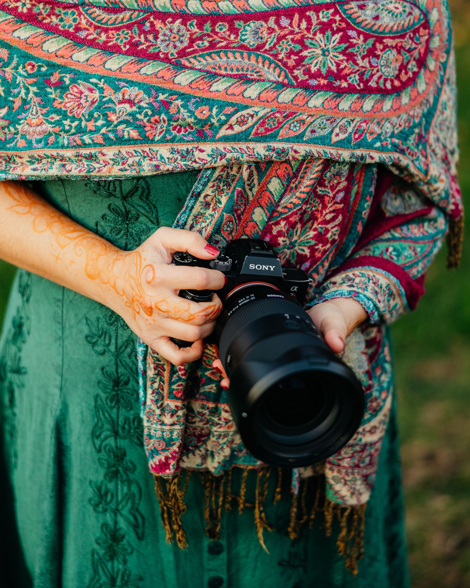 A photo of a person holding a camera