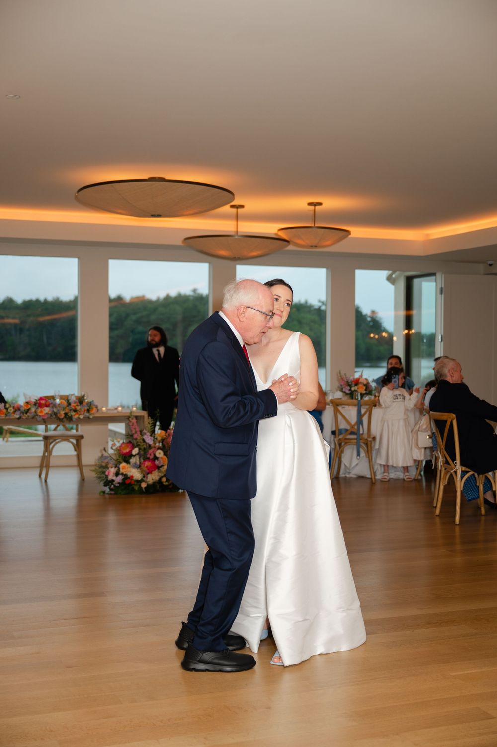 A father-daughter dance during a wedding reception at the Lakehouse in Massachusetts.