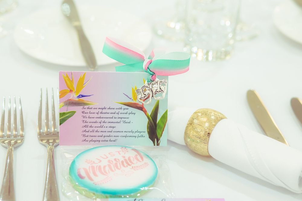 Place settings with mint green accents, floral centerpieces, and elegant tableware create a soft spring-inspired party atmosphere.