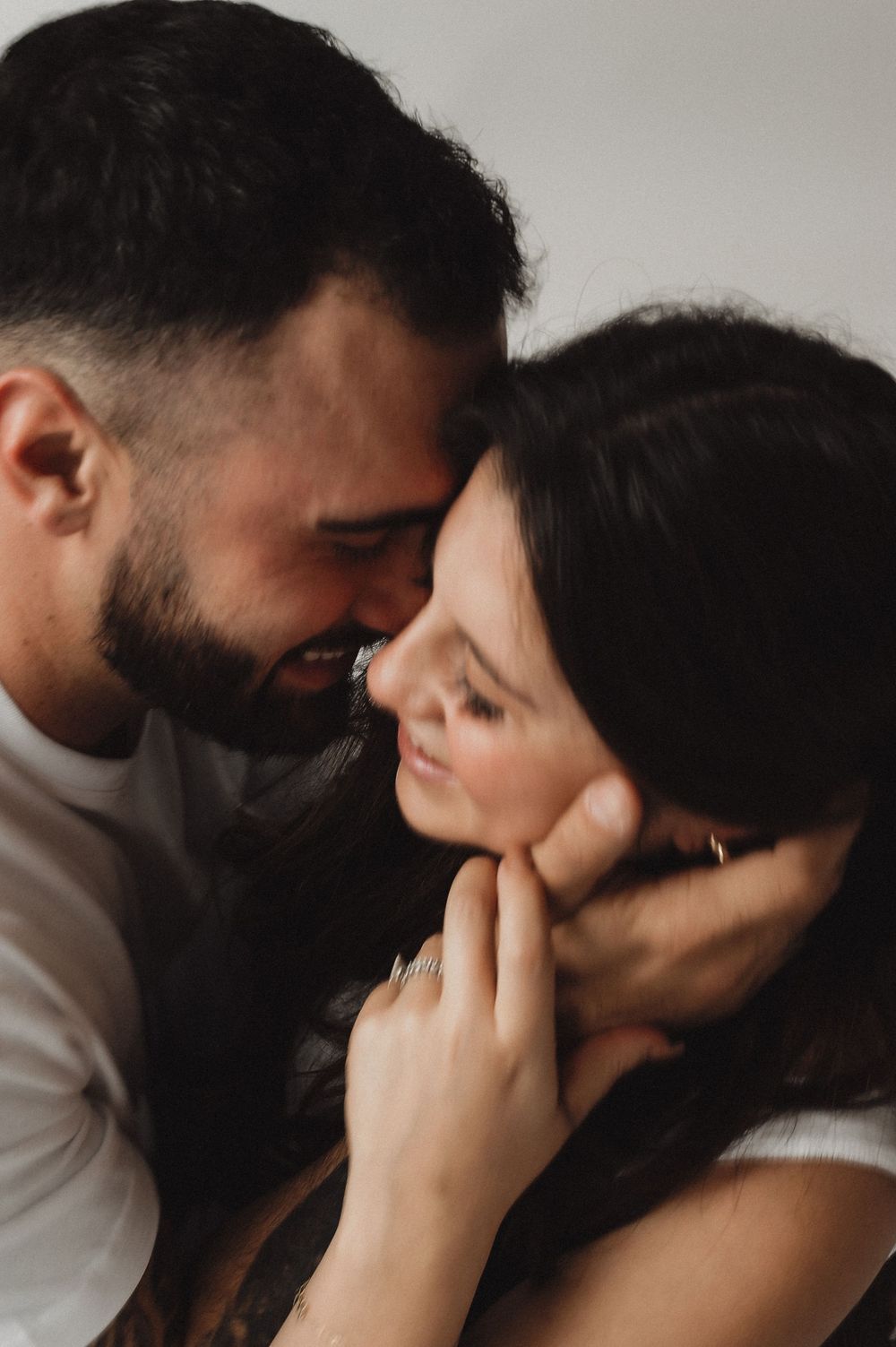 An intimate close-up sequence showing tender moments between partners.